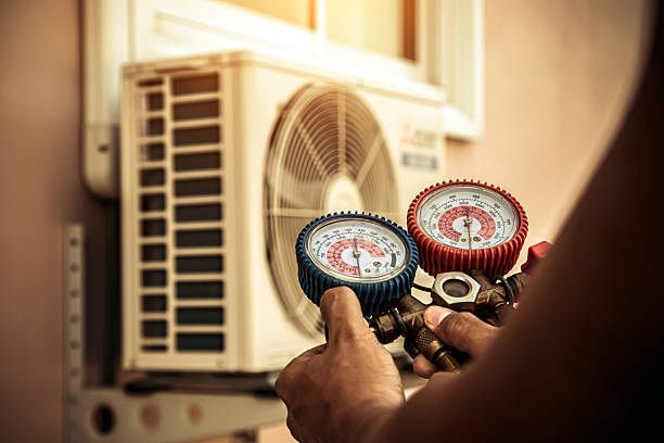 Professional Air Conditioning Service technician working in North Providence, RI